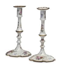 A Pair of Battersea Enamel Candlesticks