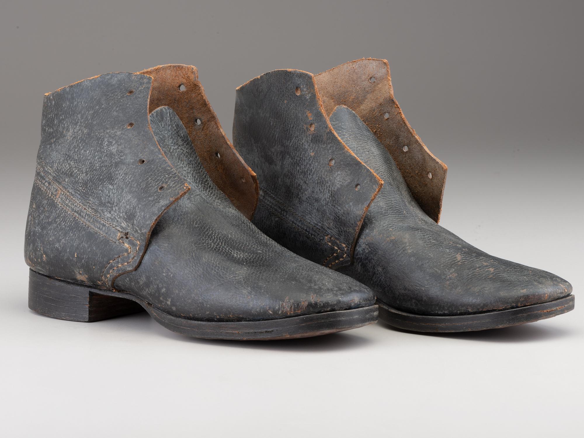 [CIVIL WAR]. A pair of military-issue brogans with a pair of Civil War-period socks.