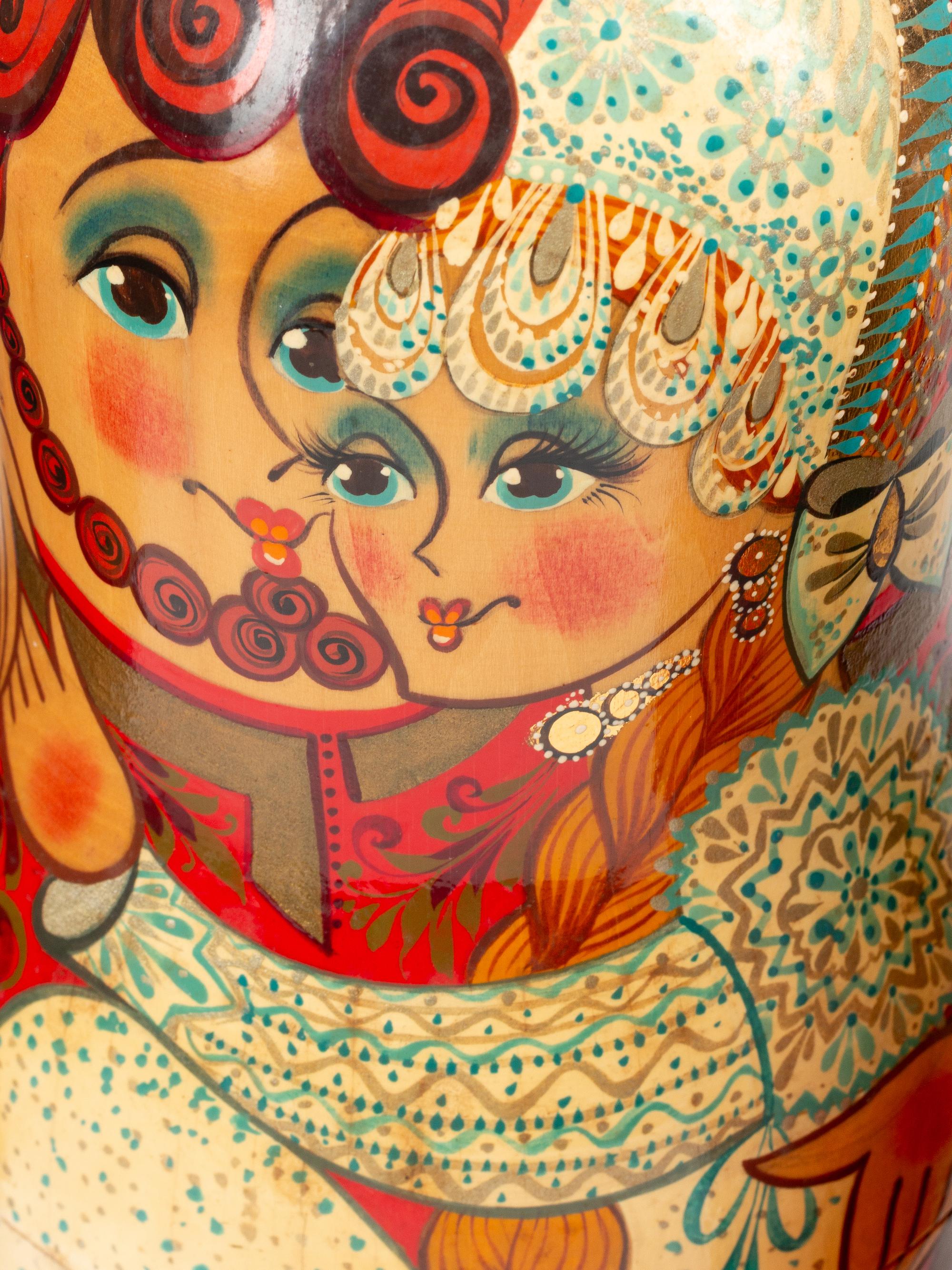 A Collection of Eight Russian Lacquer Matryoshka Nesting Dolls