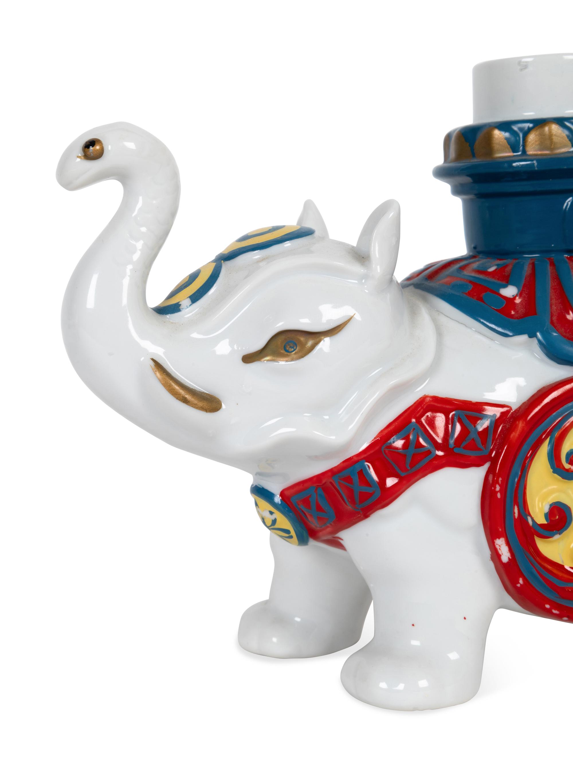 A Pair of Porcelain Elephant-Form Candlesticks
