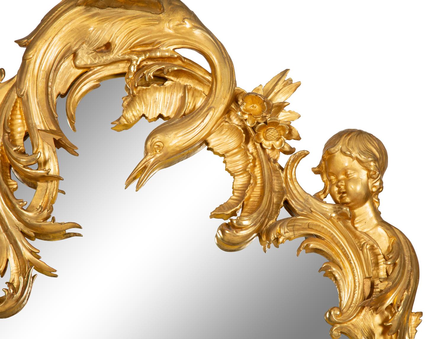 A French Rococo-Style Carved Giltwood Mirror