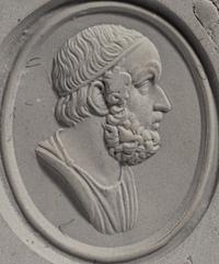 A Neoclassical Gold and Carnelian Finger Ring with Portrait Head of Homer