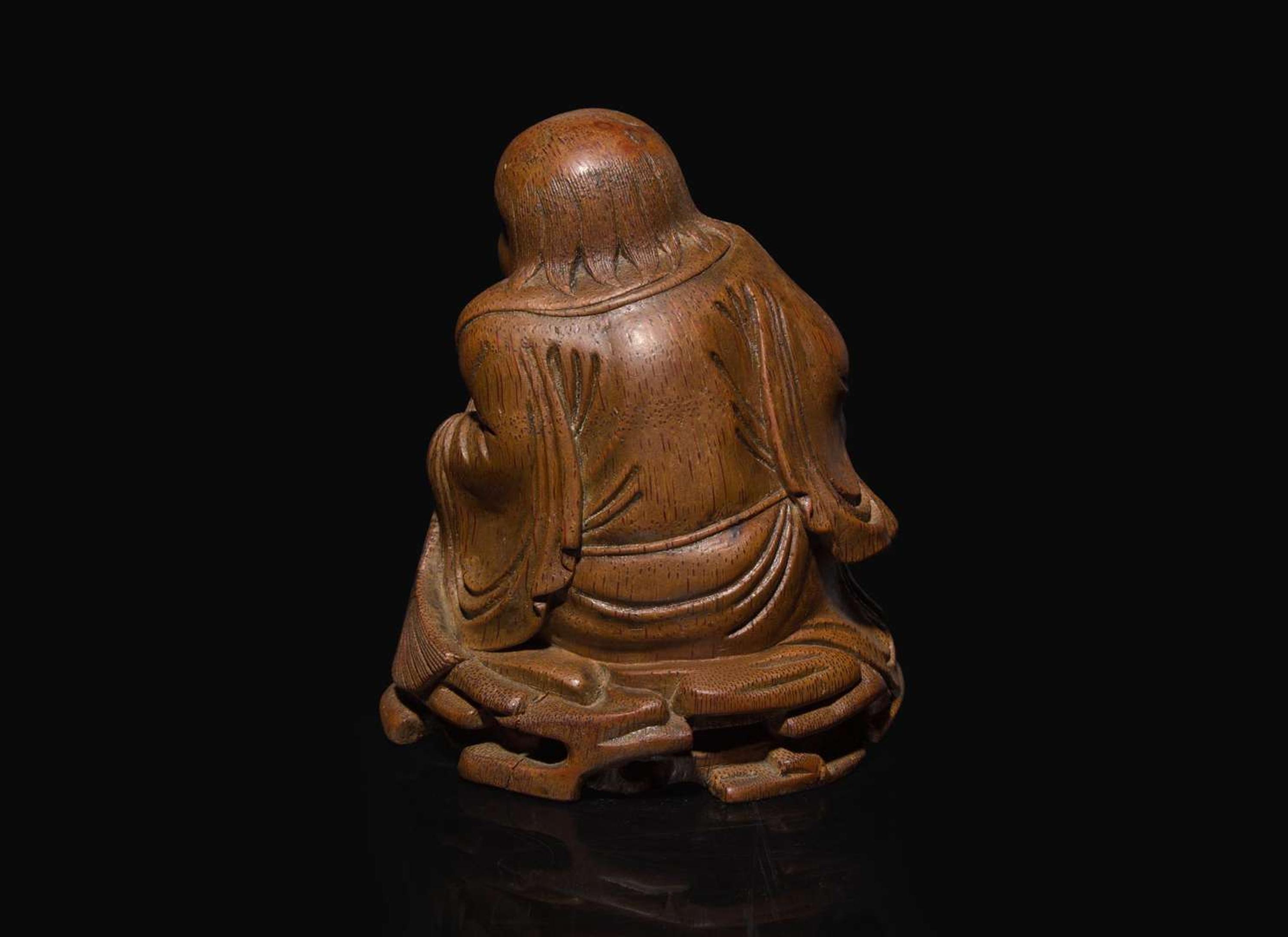 A Chinese carved bamboo figure of the immortal Liu Hai, Qing dynasty, 19th century or earlier 竹雕劉海 清 十九世紀或更早