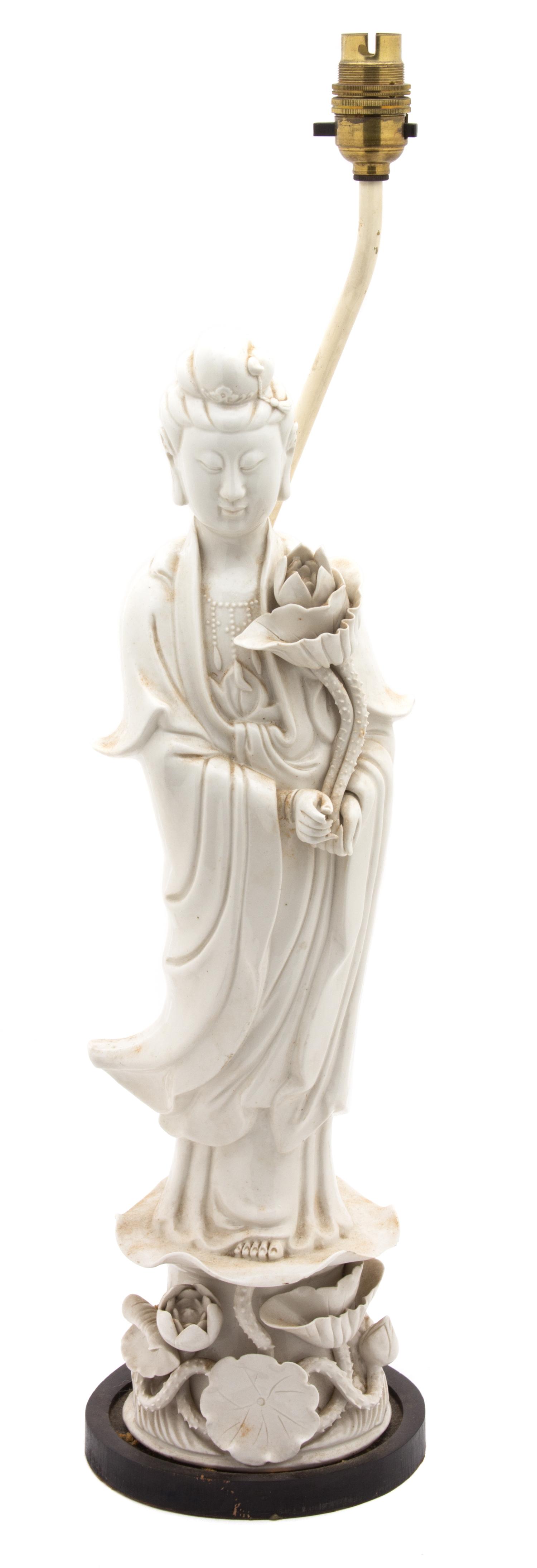 A Chinese Blanc de Chine Porcelain Figure of Guan Yin Height of figure 18 1/2 inches. Lamp height 23 1/2 inches. — 20TH CENTURY