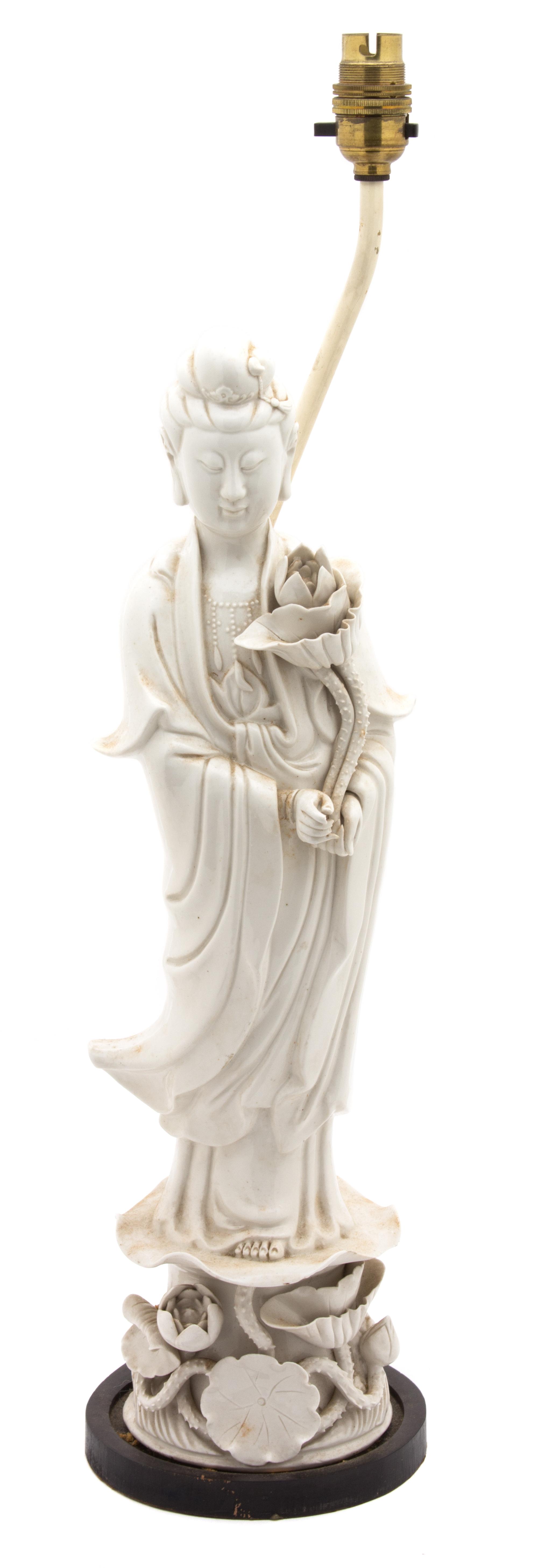 A Chinese Blanc de Chine Porcelain Figure of Guan Yin Height of figure 18 1/2 inches. Lamp height 23 1/2 inches. — 20TH CENTURY