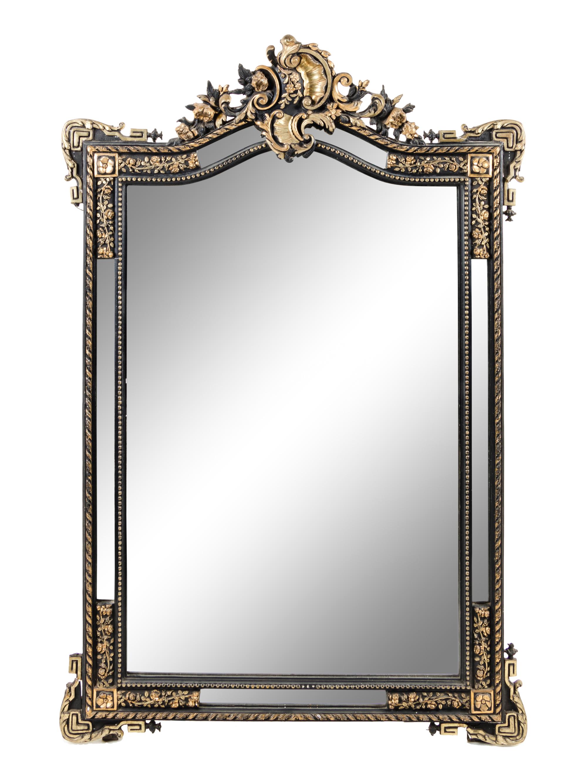 A Rococo Style Gilt and Ebonized Mirror