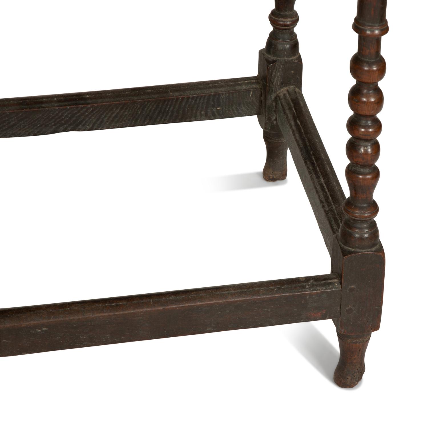 A Jacobean Style Carved Oak Writing Table and a Similar Stool with Flip Top
