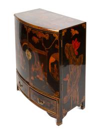 A Regency Style Black Japanned Bow-Front Cabinet