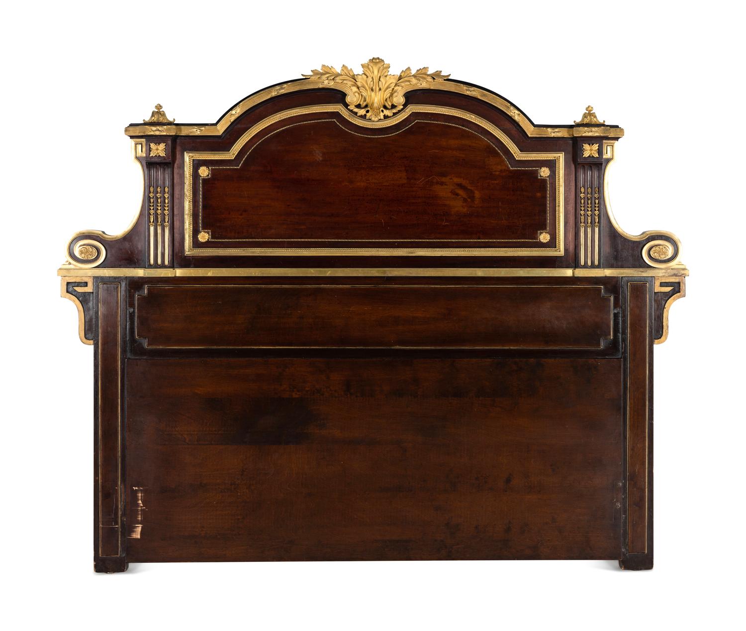 A Louis XVI Style Gilt Bronze Mounted Mahogany Headboard