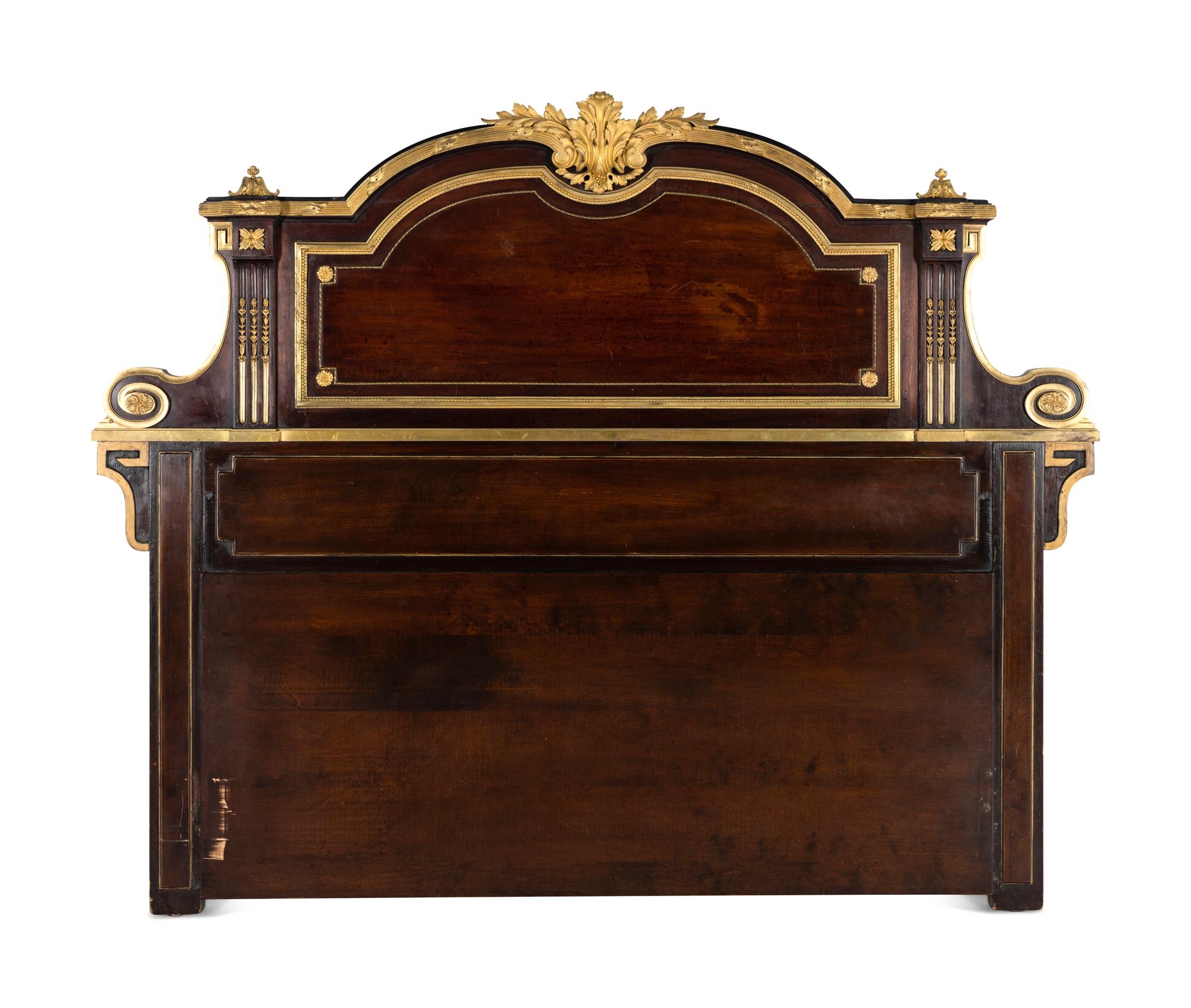 A Louis XVI Style Gilt Bronze Mounted Mahogany Headboard