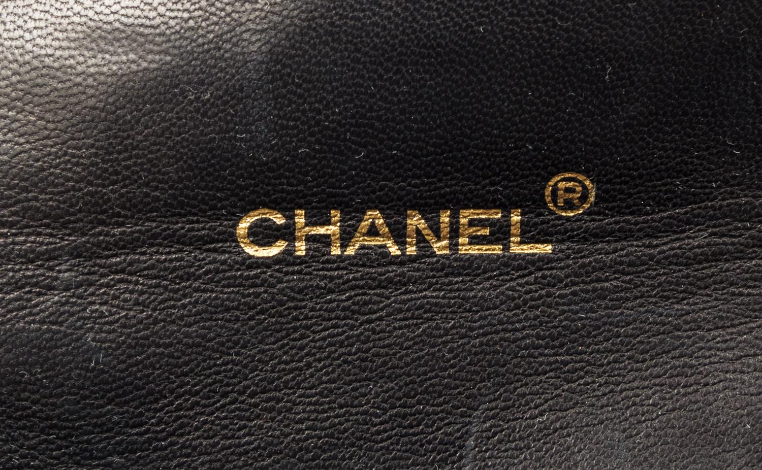A Chanel Navy Classic Leather Handbag, 8.5" x 6.5" x 3".