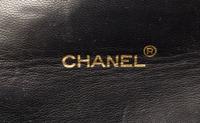 A Chanel Navy Classic Leather Handbag, 8.5" x 6.5" x 3".