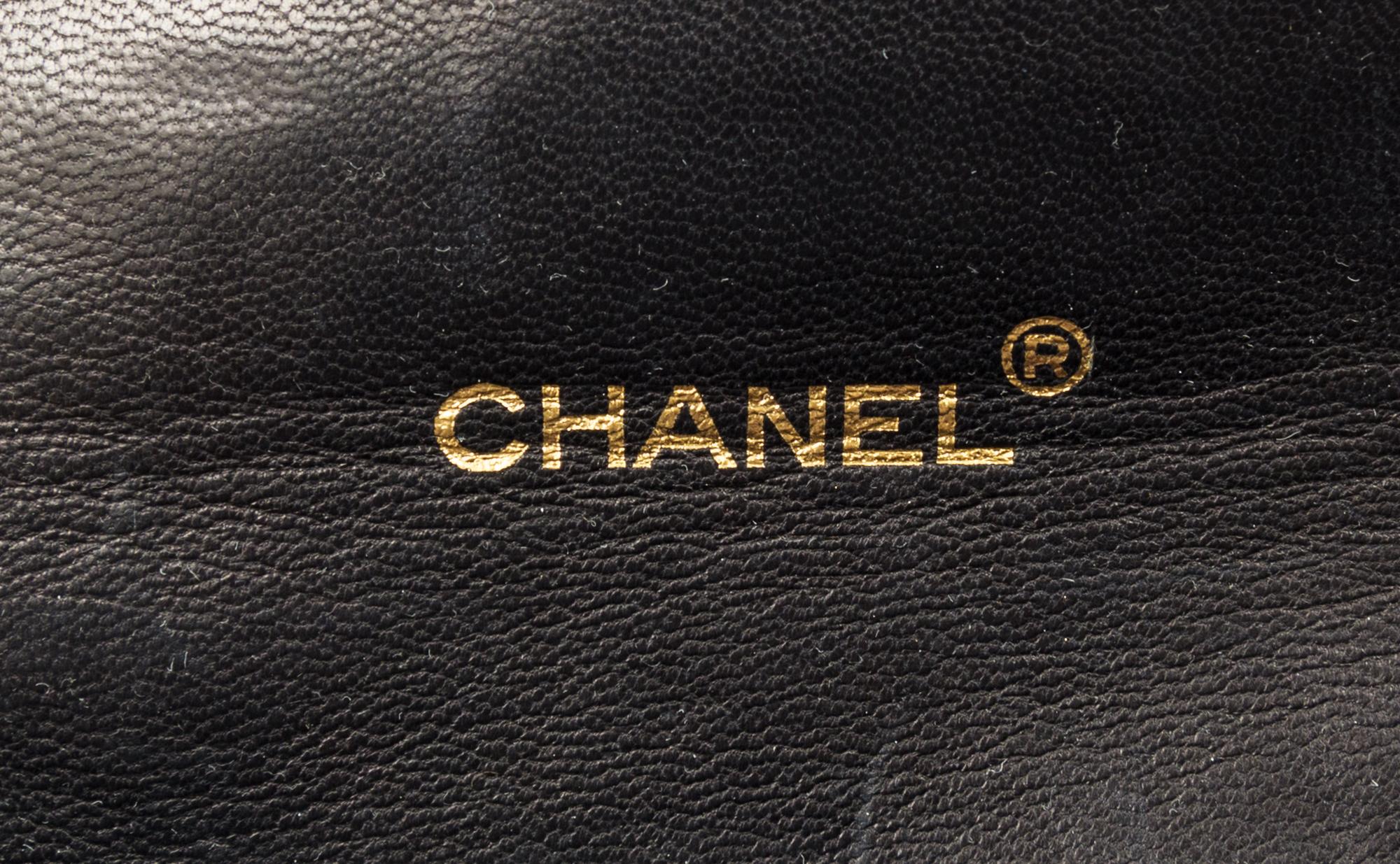 A Chanel Navy Classic Leather Handbag, 8.5" x 6.5" x 3".