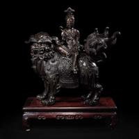 A large Japanese patinated bronze figural censer depicting a Bodhisattva on a lion 日本铜加漆菩萨骑狮像 19th/20th century ???????
