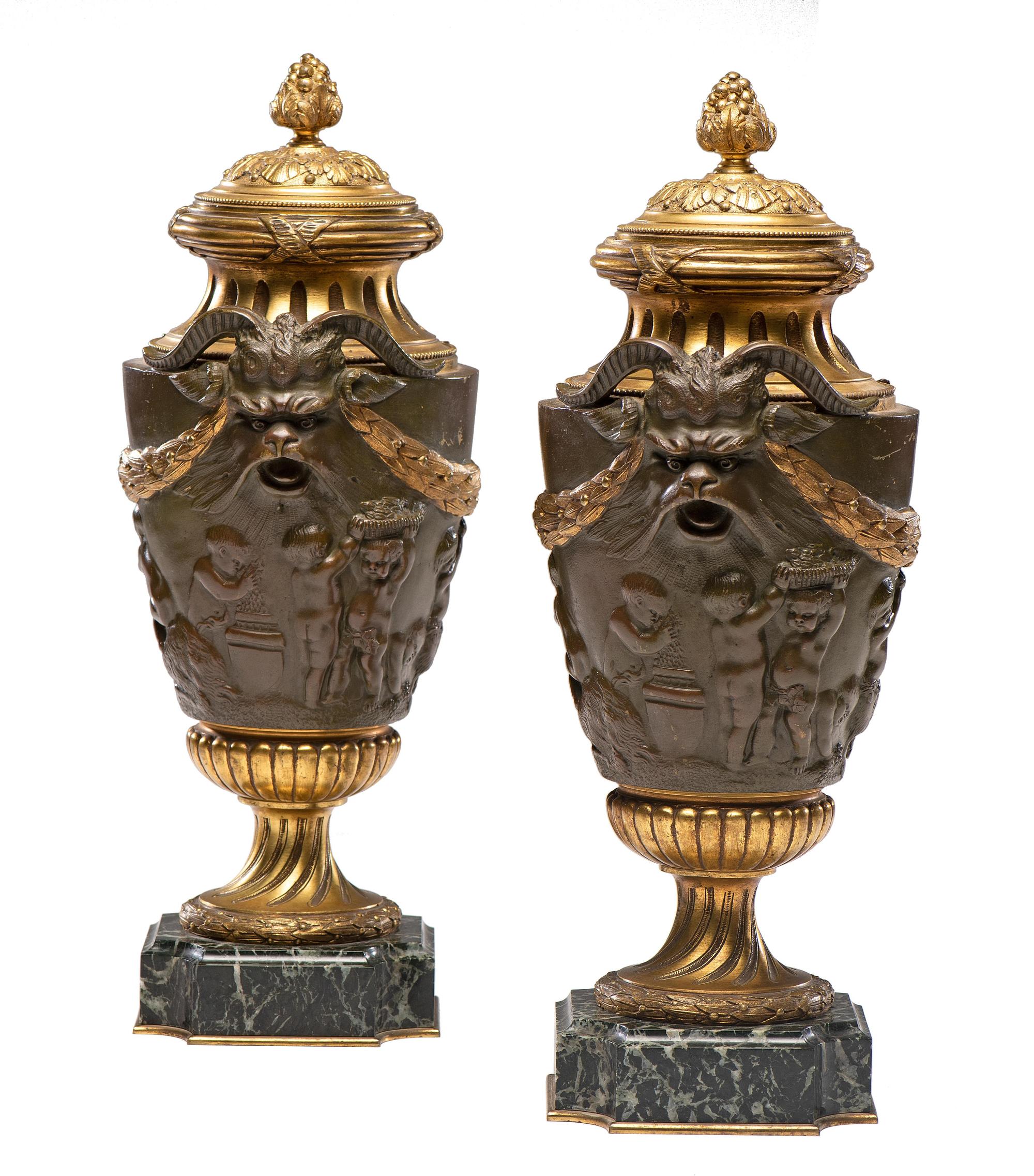 A Pair of Neoclassical Gilt and Patinated Bronze Urns