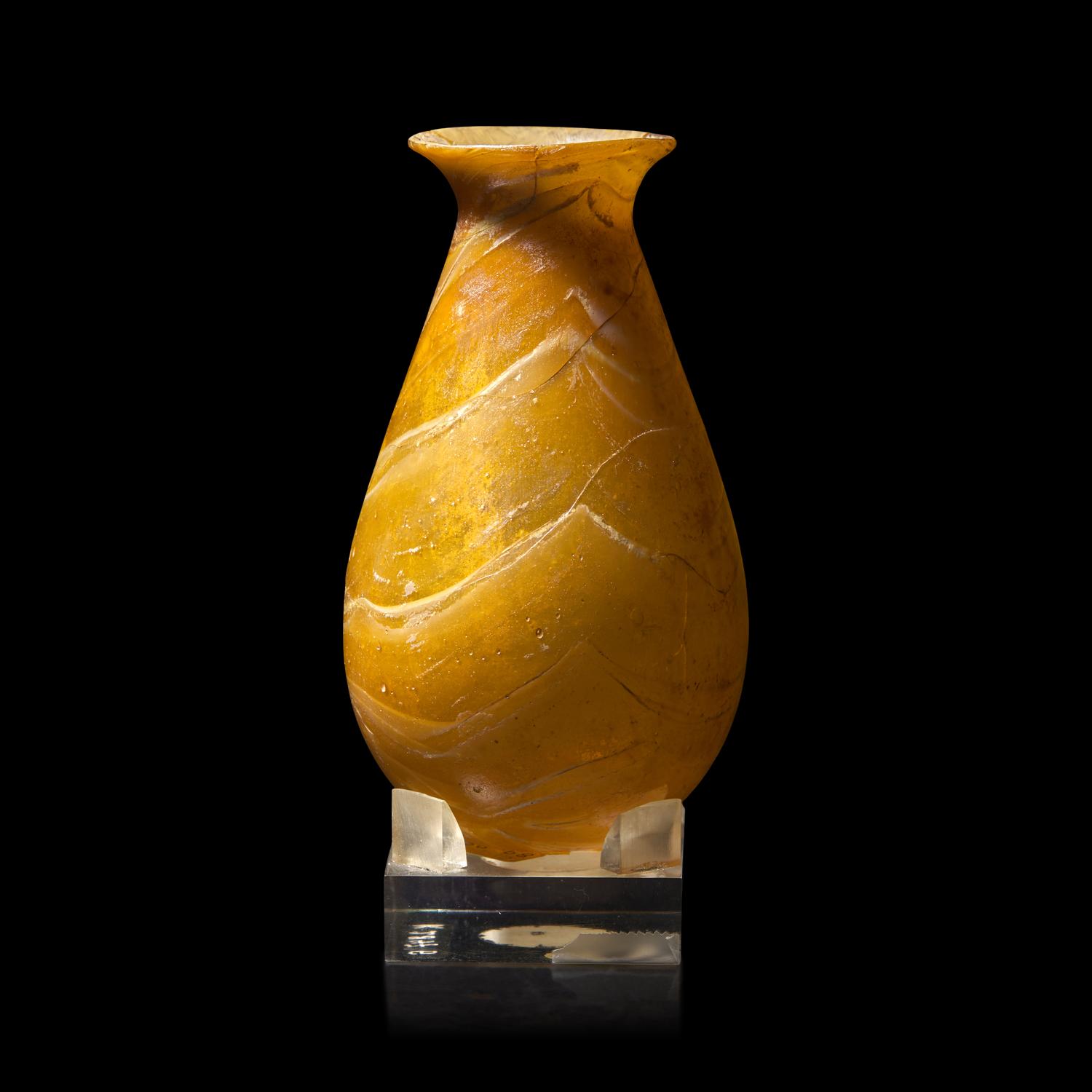 A Roman Amber Marbled Glass Flask