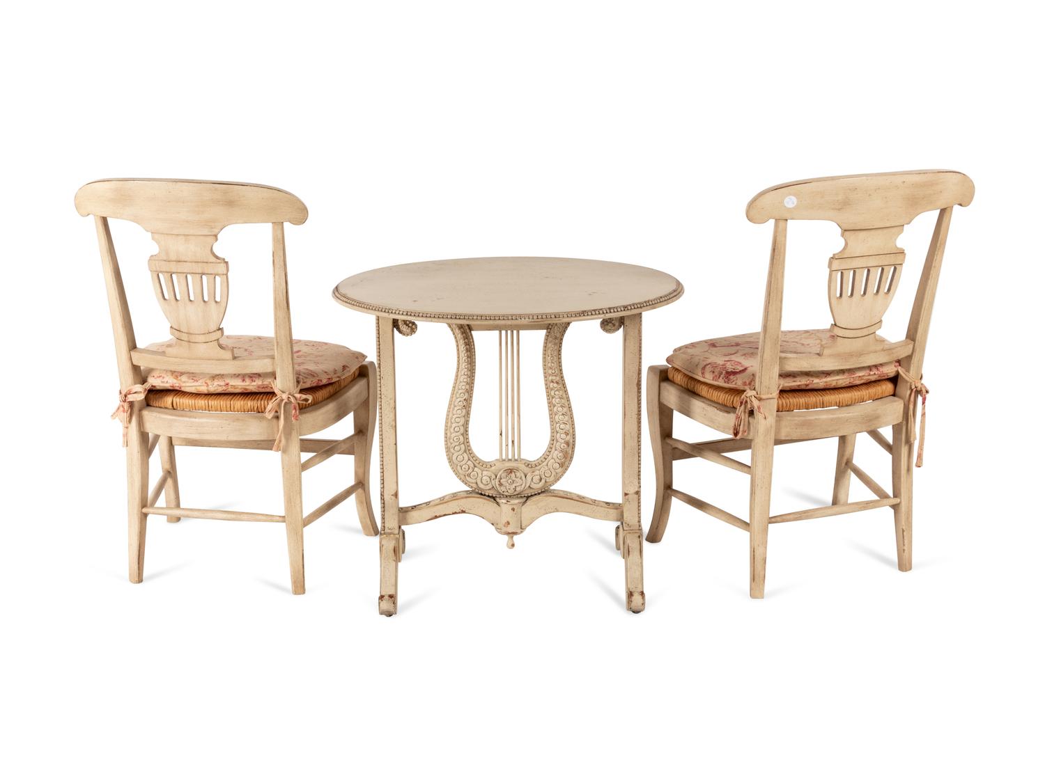 A Pair of Gustavian Style White-Painted Side Chairs and an Associated Table