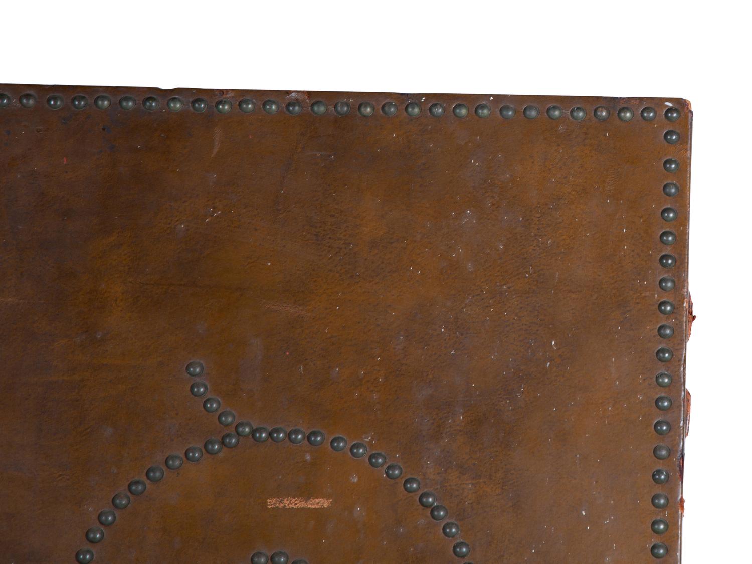 A Nailhead-Decorated Leather Three-Panel Floor Screen — 20TH CENTURY