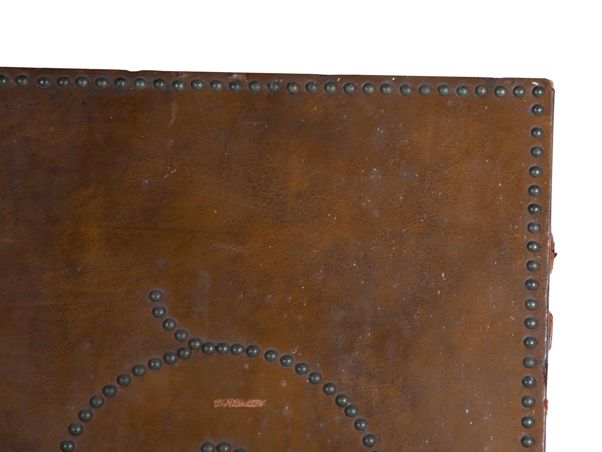 A Nailhead-Decorated Leather Three-Panel Floor Screen — 20TH CENTURY