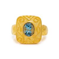 HIGH KARAT GOLD AND BLUE TOPAZ RING