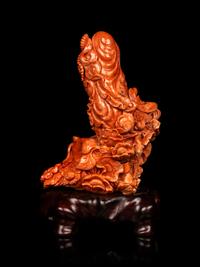 A Chinese Red Coral Carving of Guanyin