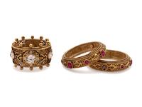 Dior goldtone belt and three bracelets