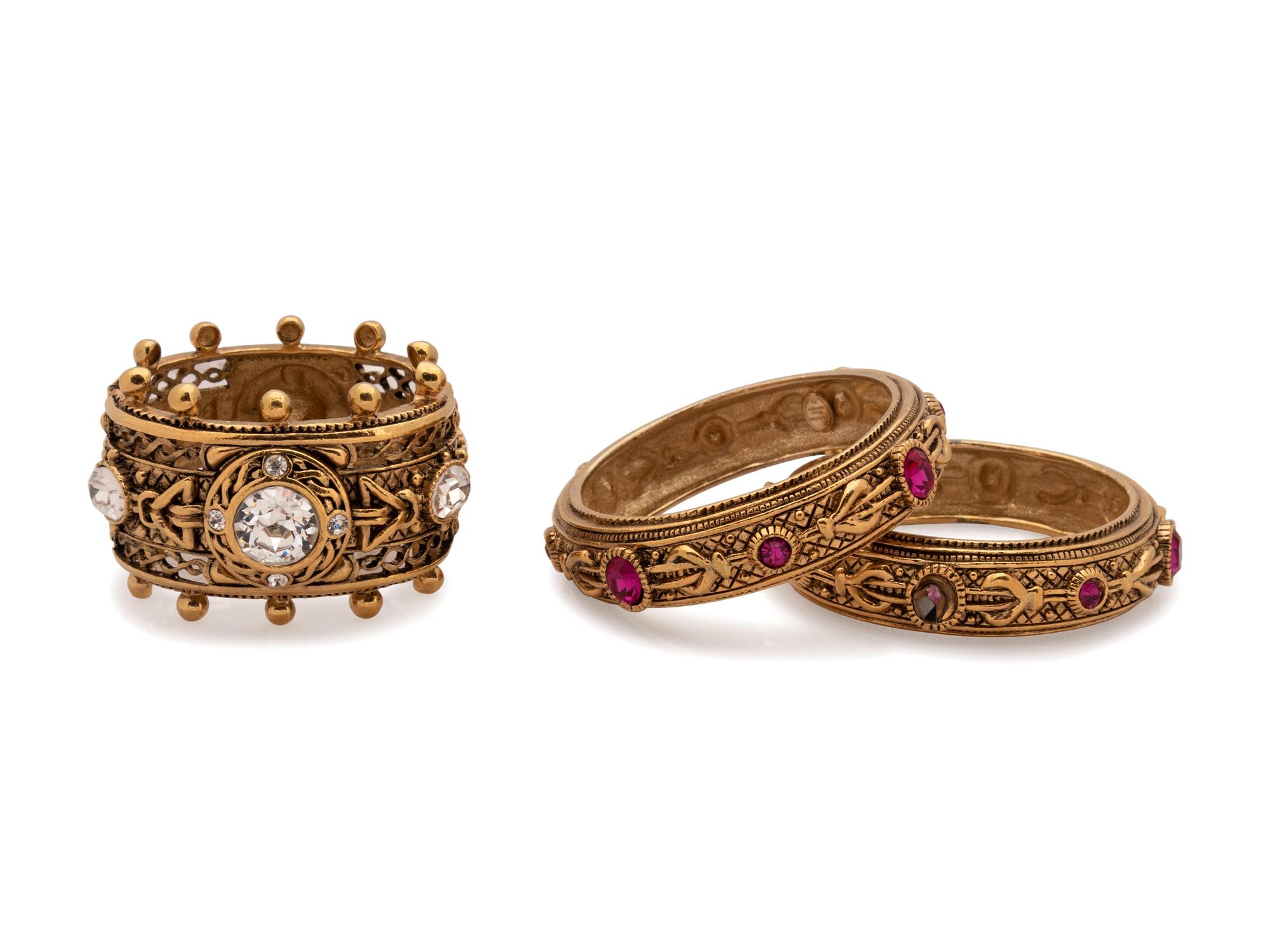 Dior goldtone belt and three bracelets