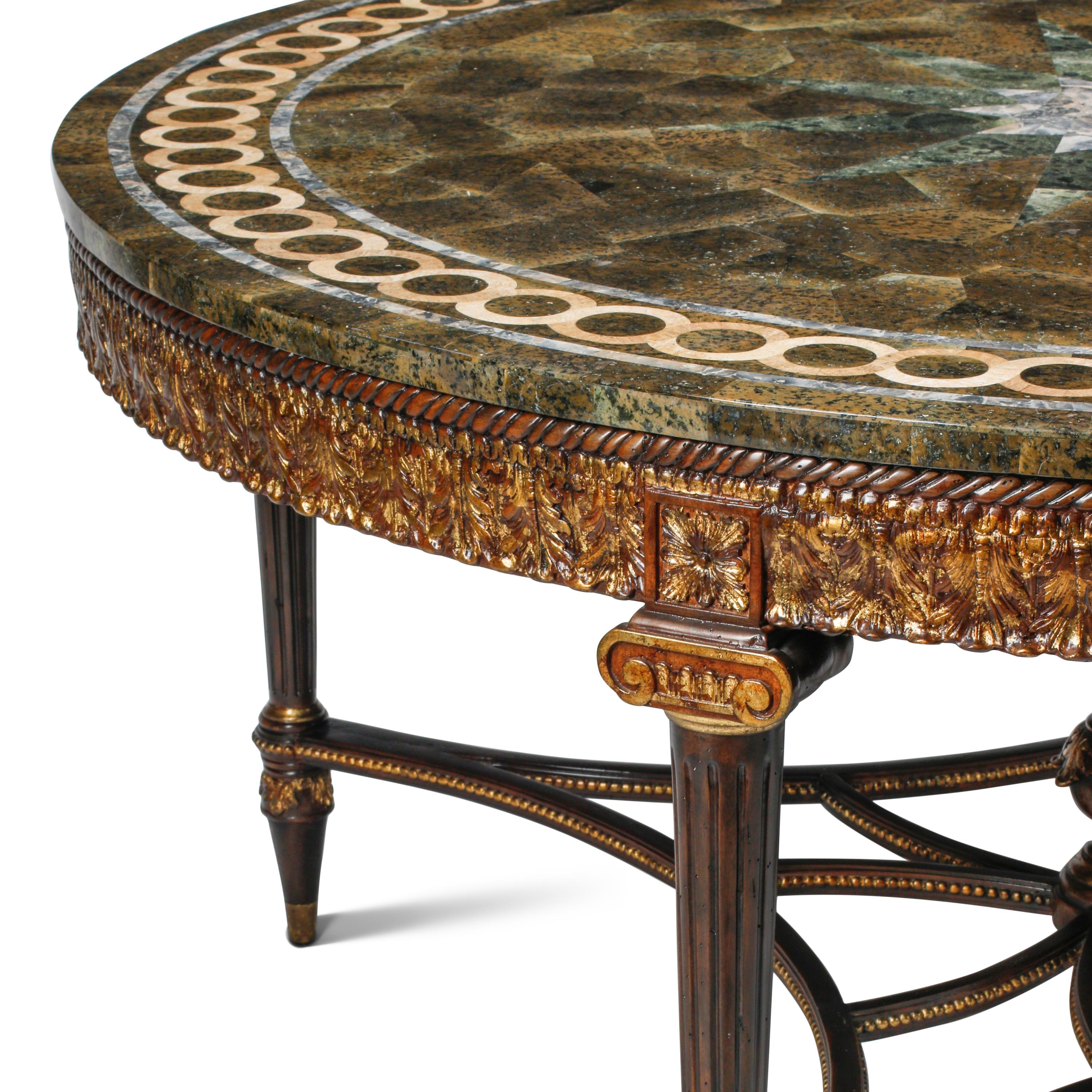 A Louis XVI Style Parcel Gilt Mahogany and Specimen Marble-Top Center Table