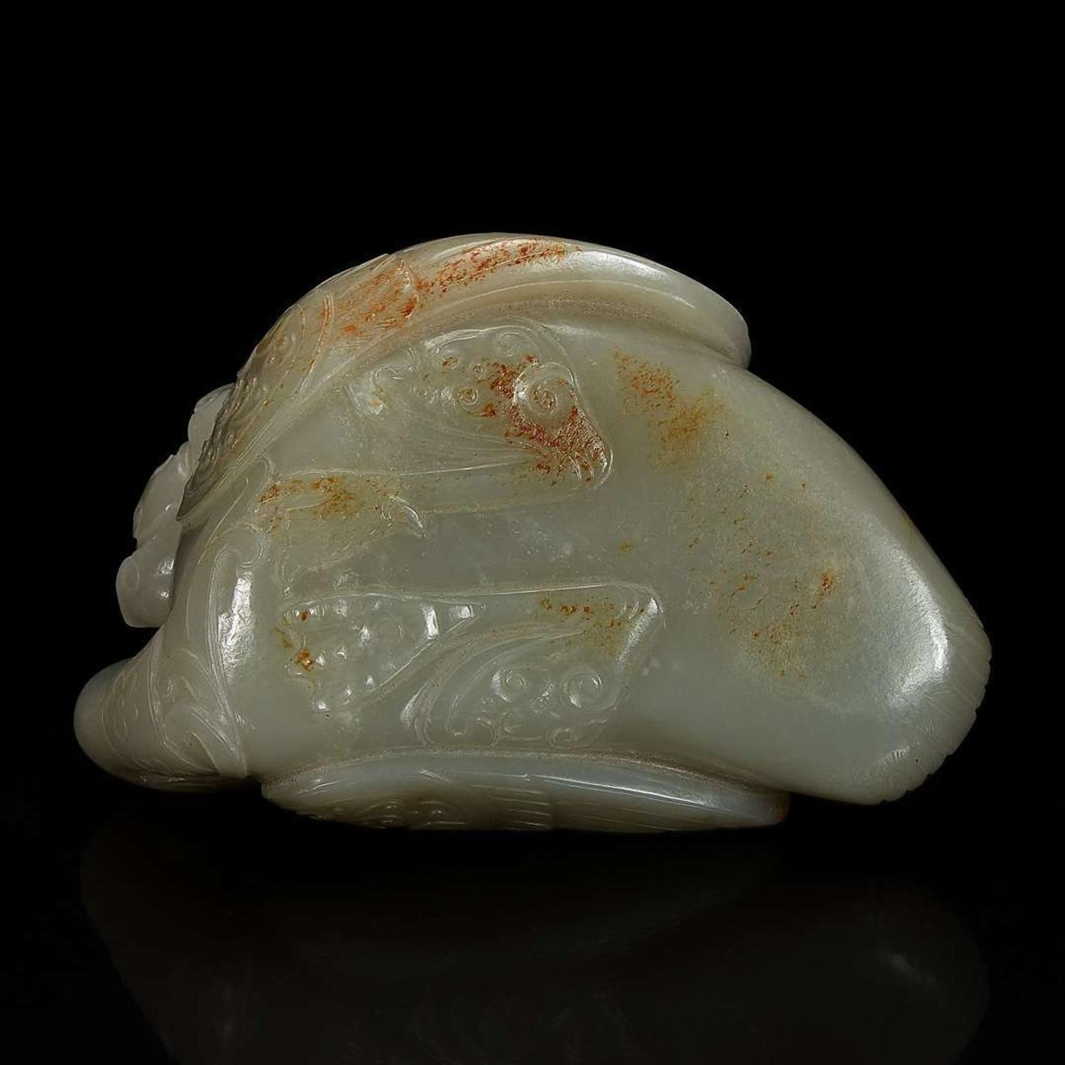 A Chinese celadon jade archaistic "Duck" water coupe and carved wood stand 青玉鸭形水丞配木底座 Qing dynasty ?