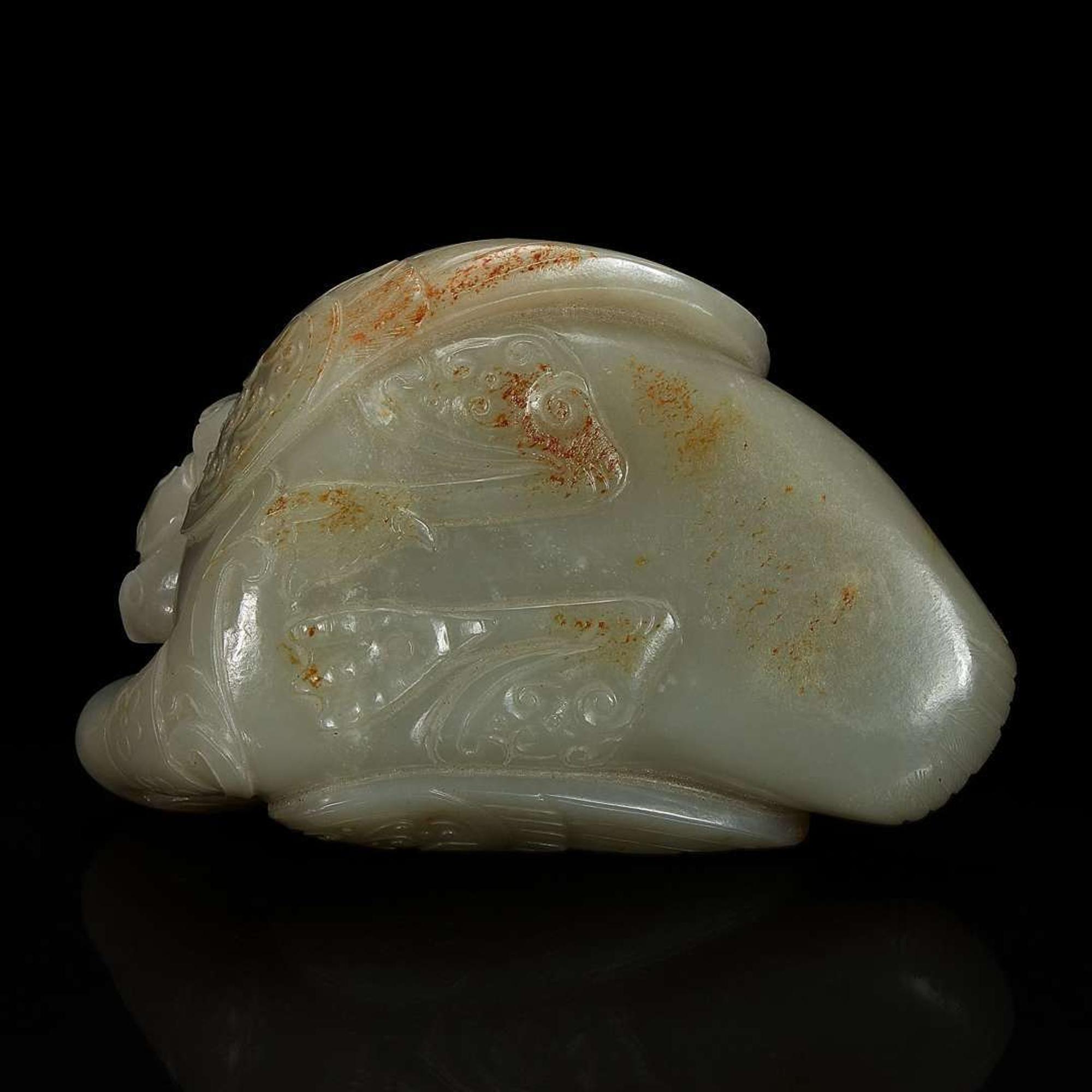 A Chinese celadon jade archaistic "Duck" water coupe and carved wood stand 青玉鸭形水丞配木底座 Qing dynasty ?