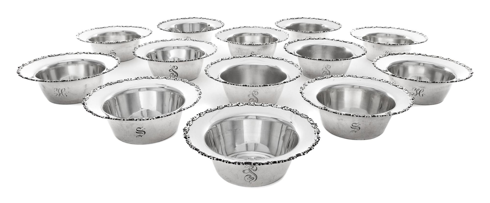 A Set of Twenty-Two American Silver Nut Dishes, Shreve & Co., San Francisco, CA, 20th Century, the rim worked with C-scroll and floral