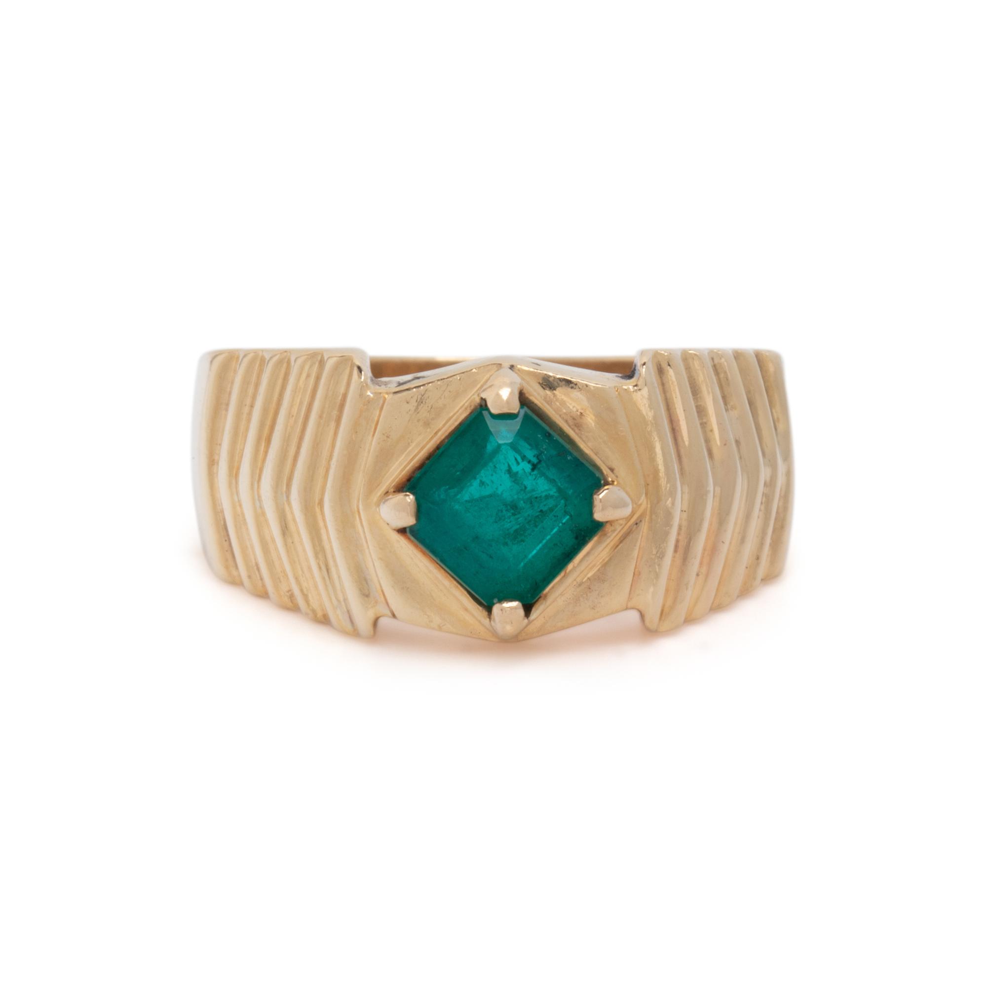 YELLOW GOLD AND EMERALD RING