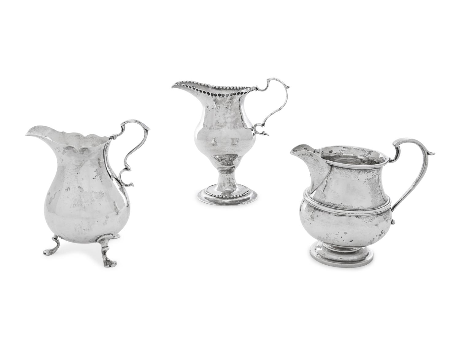 Three Silver Creamers