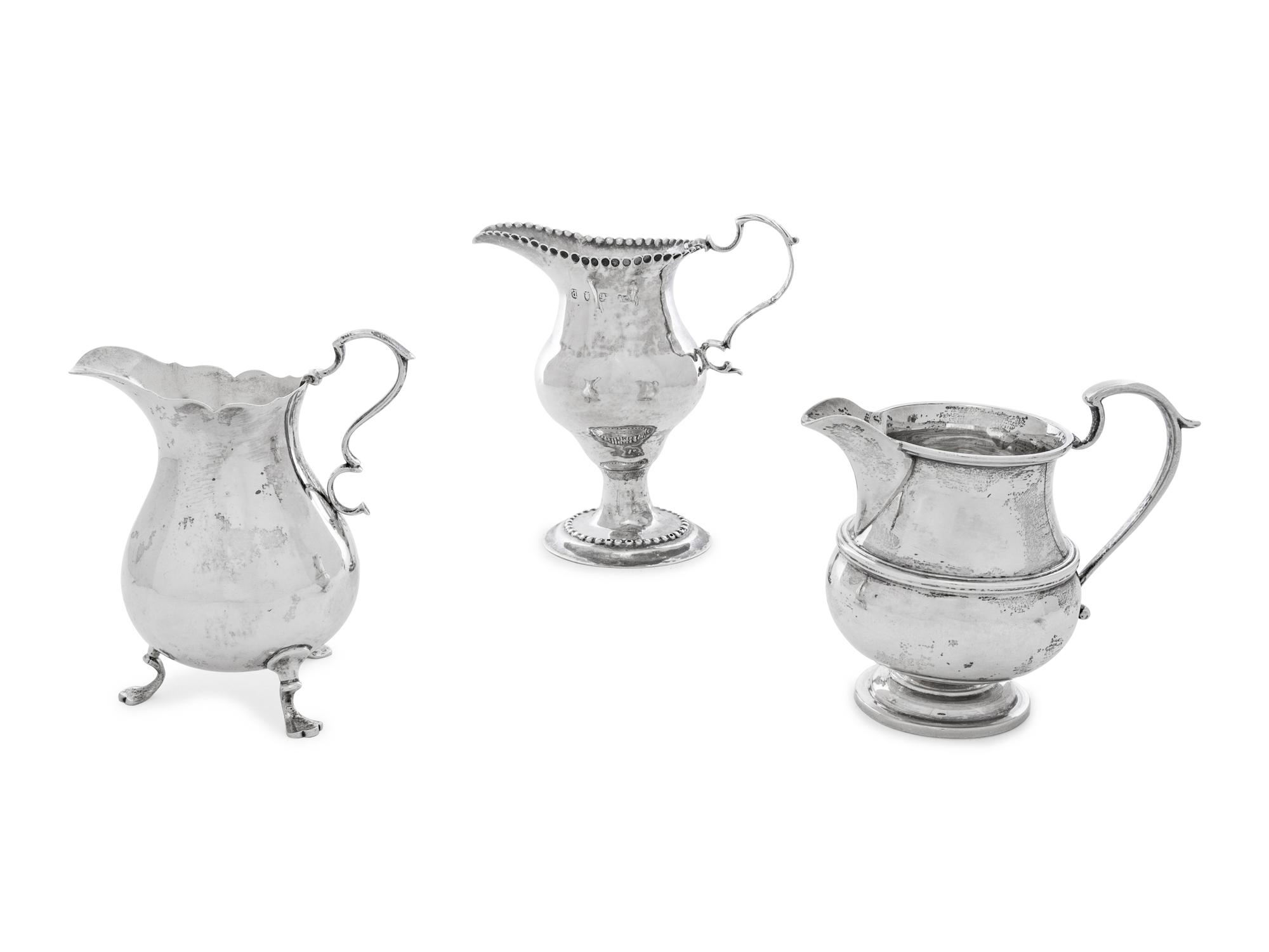 Three Silver Creamers