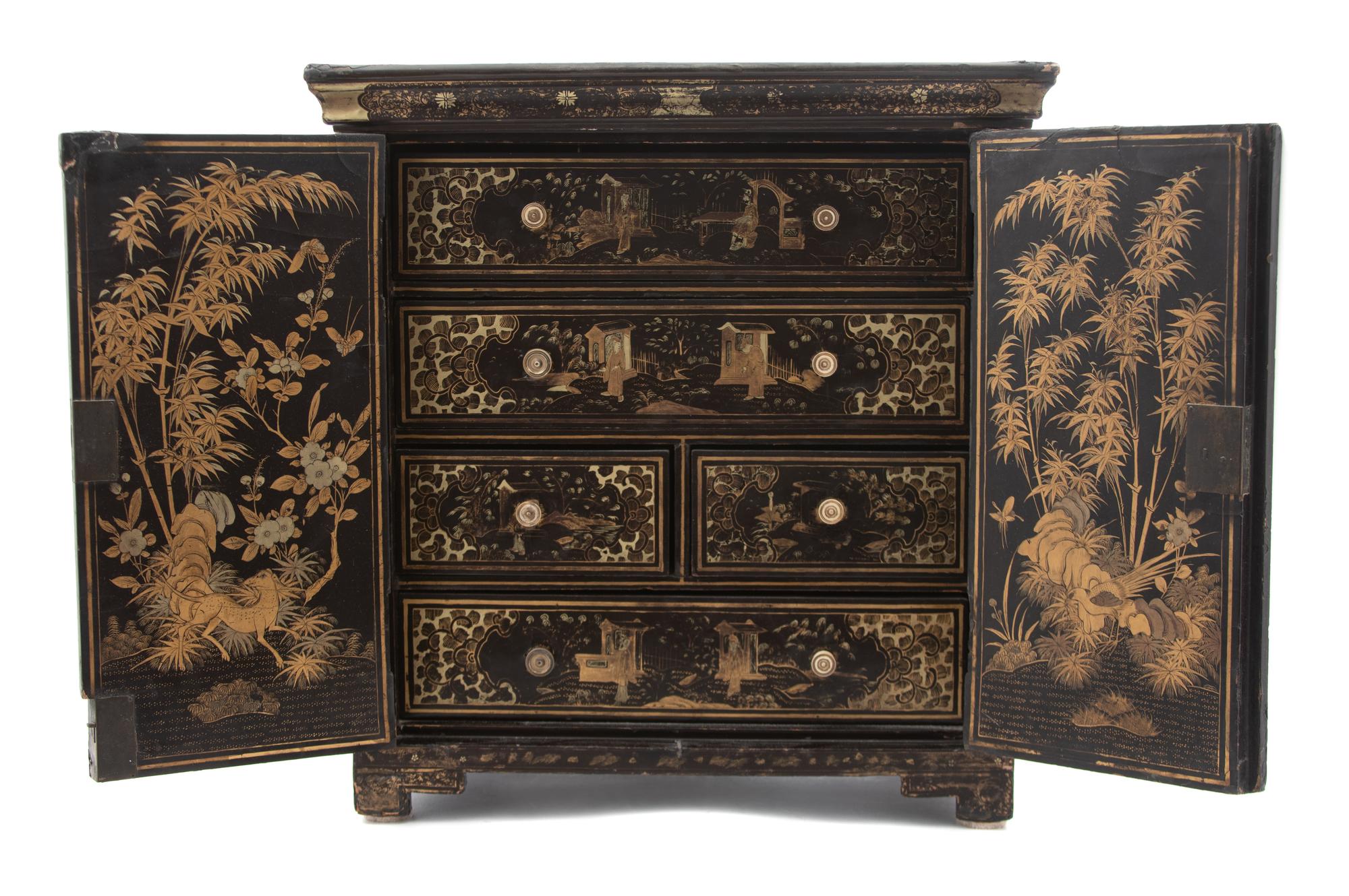 A Chinese Export Black and Gilt Lacquer Chinoiserie Decorated Specimen Cabinet Height 15 x width 14 1/2 x depth 8 1/2 inches. — 19TH CENTURY