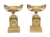 A Pair of Empire Gilt Bronze Urns on Pedestal Bases