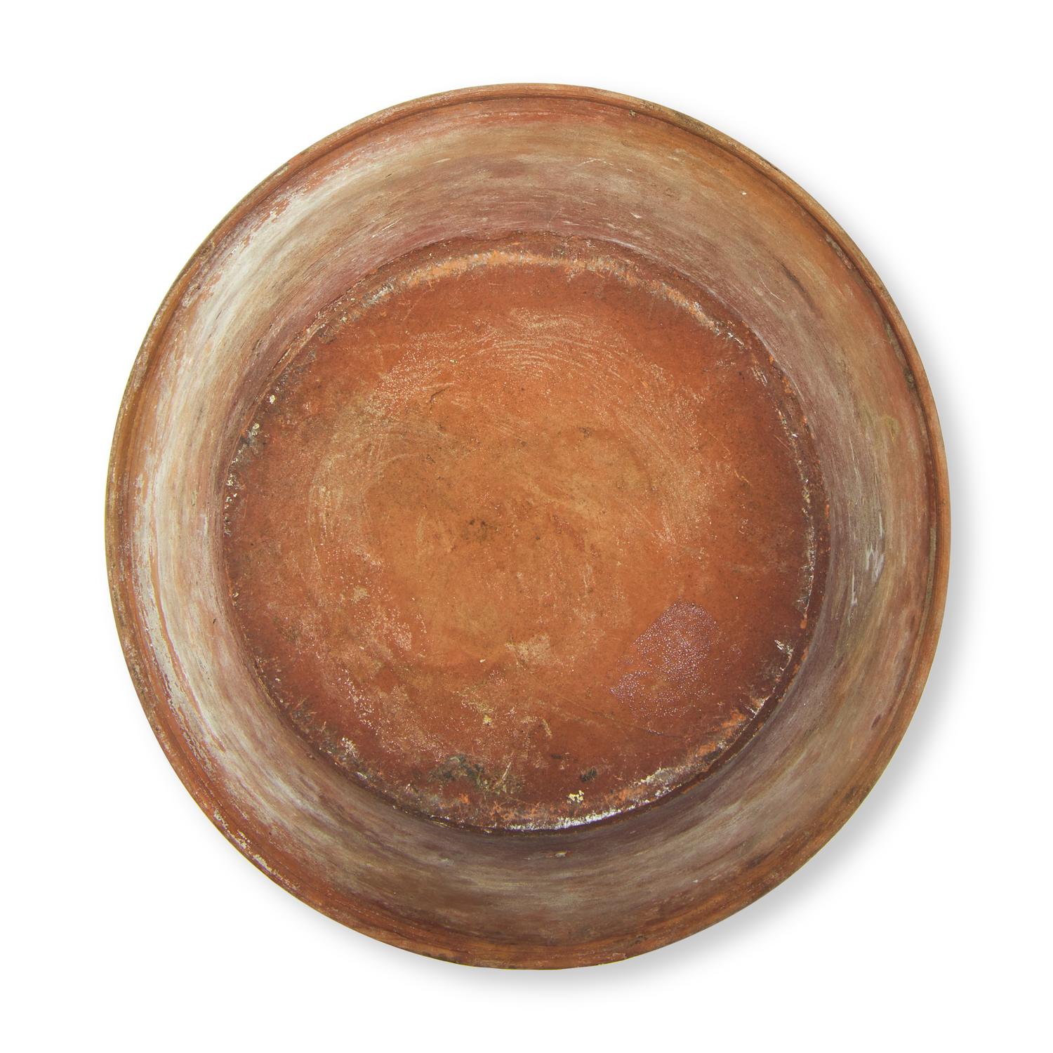 A Glazed and Slip-Decorated Redware Bowl