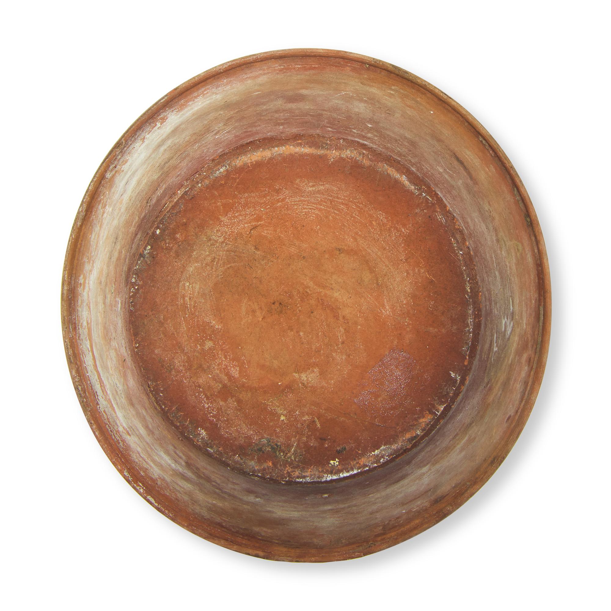 A Glazed and Slip-Decorated Redware Bowl