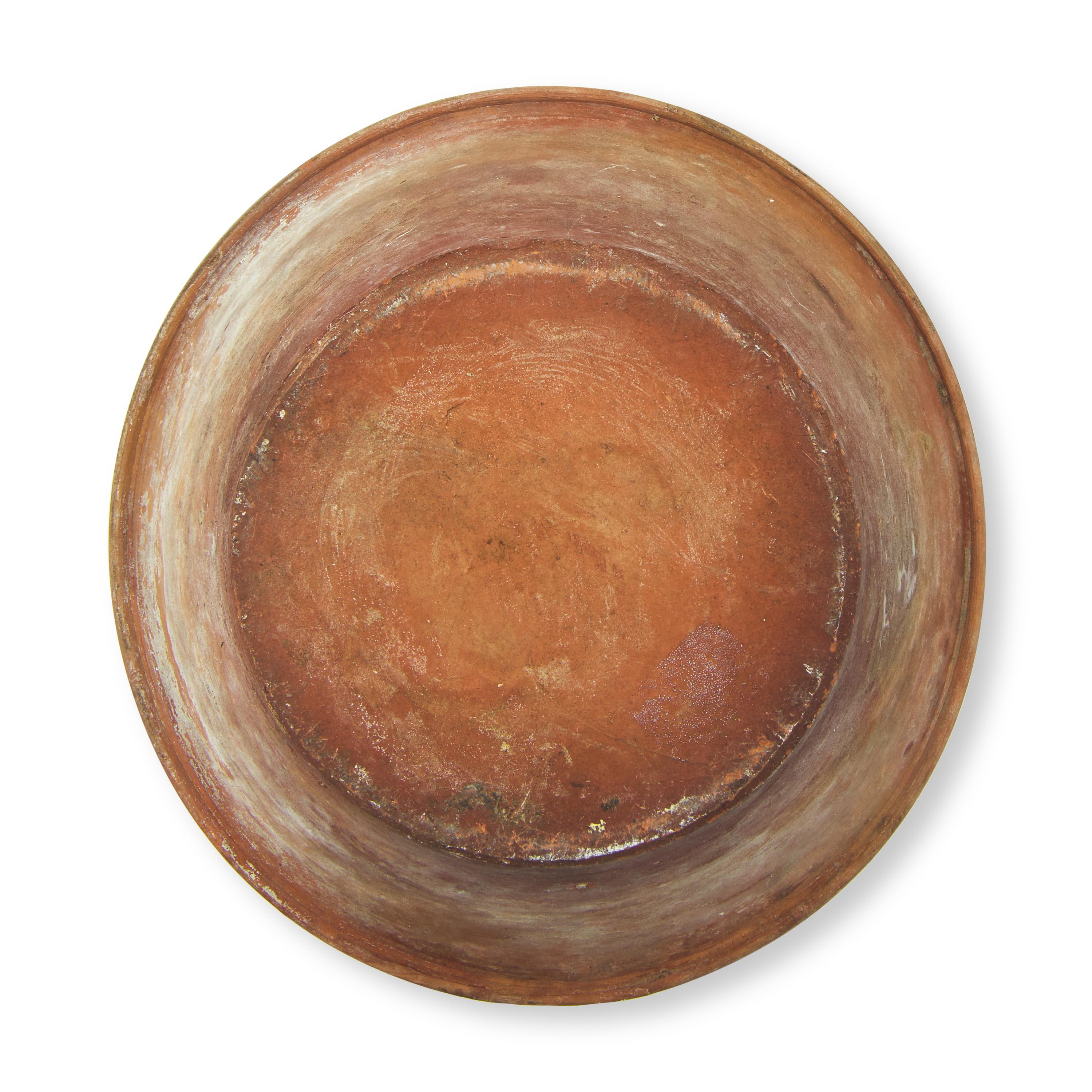 A Glazed and Slip-Decorated Redware Bowl