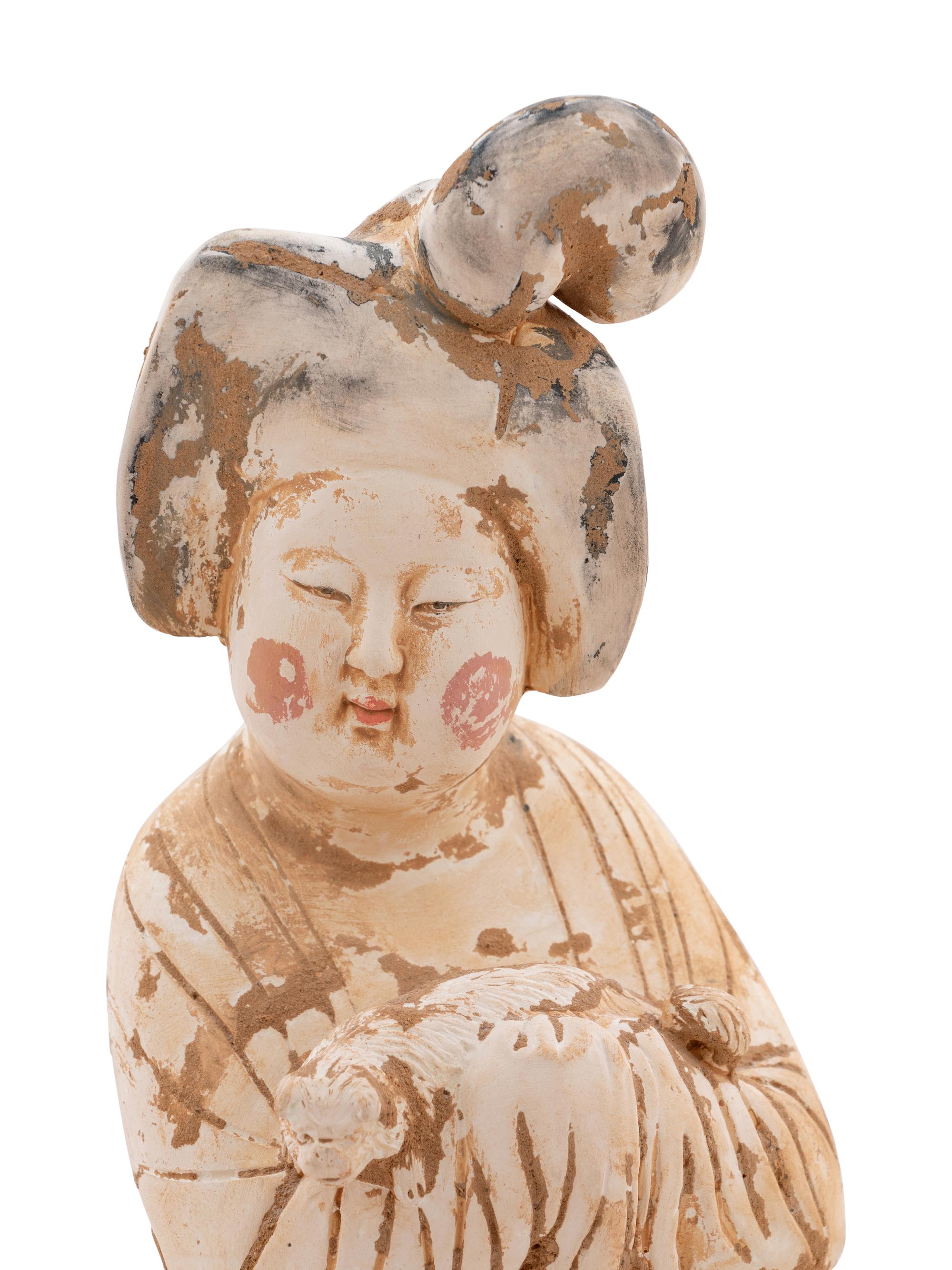 A Chinese Painted Pottery Figure of a Fat Lady