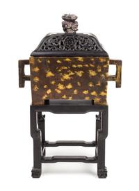 A Gilt-Splashed Bronze Rectangular Incense Burner Length 8 1/2 inches.