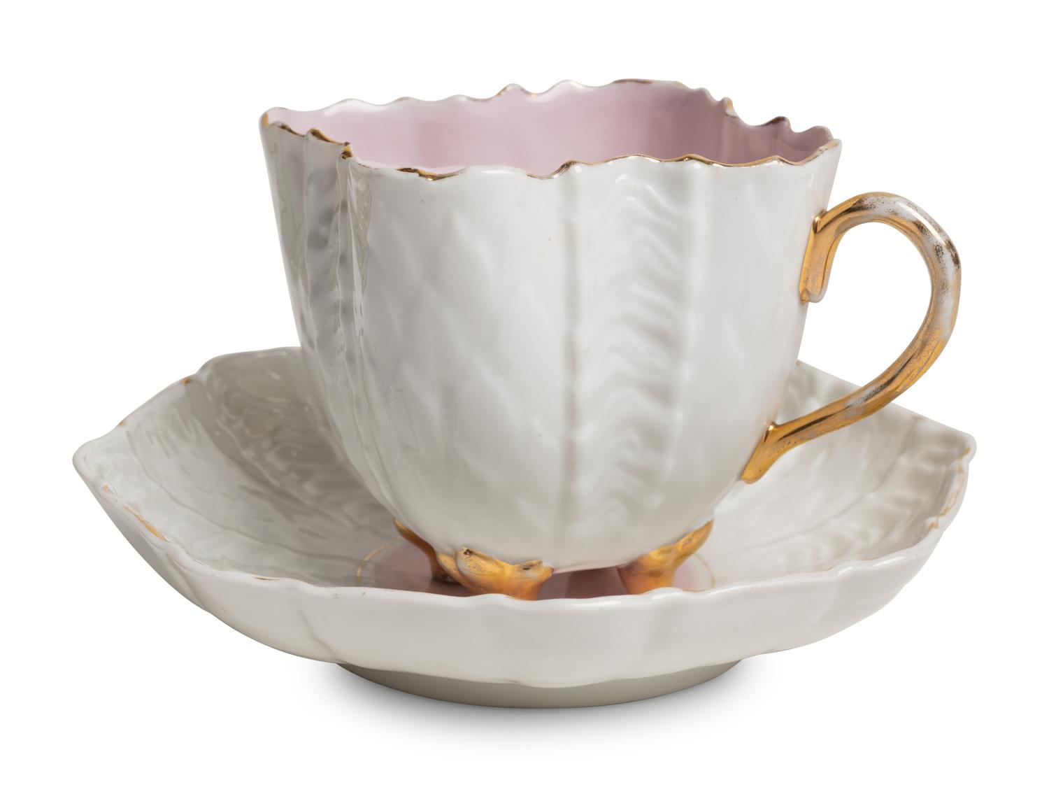 Two Continental Porcelain Moustache Cups and Saucers