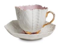 Two Continental Porcelain Moustache Cups and Saucers