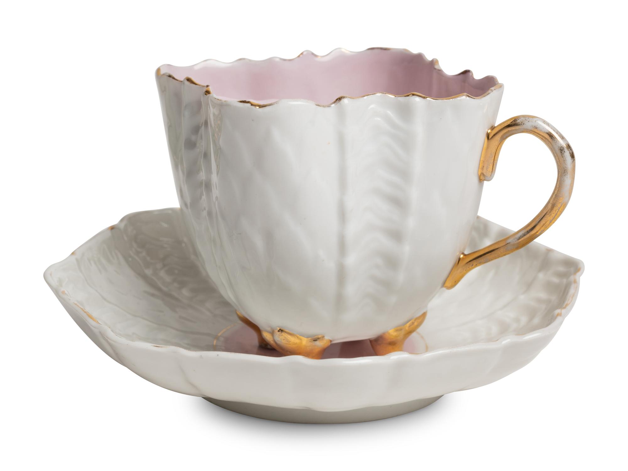 Two Continental Porcelain Moustache Cups and Saucers