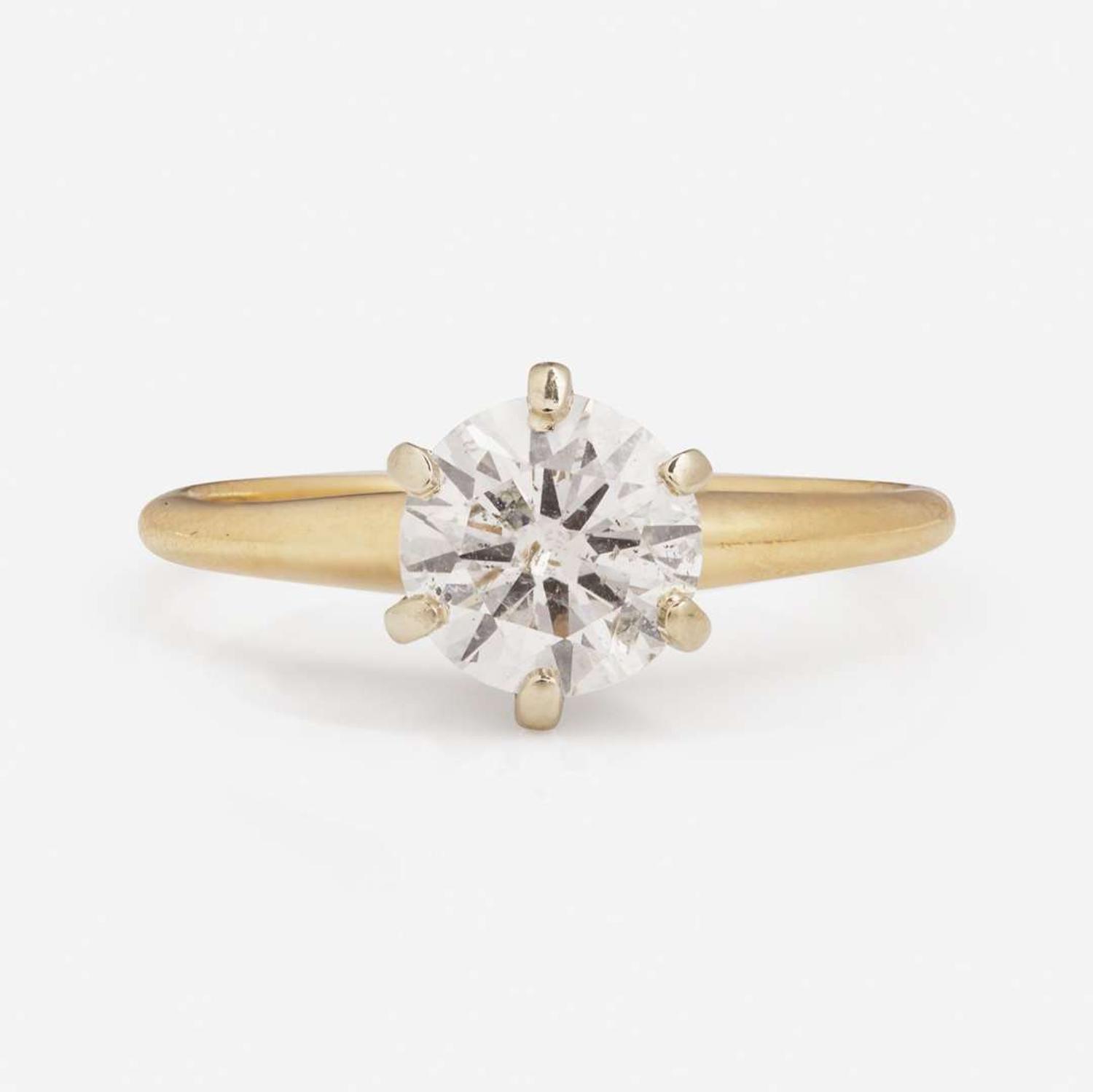A 14K Yellow Gold Solitaire Diamond Ring