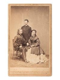 [CUSTER, George Armstrong (1839-1876)]. CDV of George, Libby, and Tom Custer. Washington, DC: Mathew Brady, 1865.