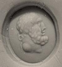 A Roman Banded Agate Ring Stone with the Portrait Head of a Bearded Hercules