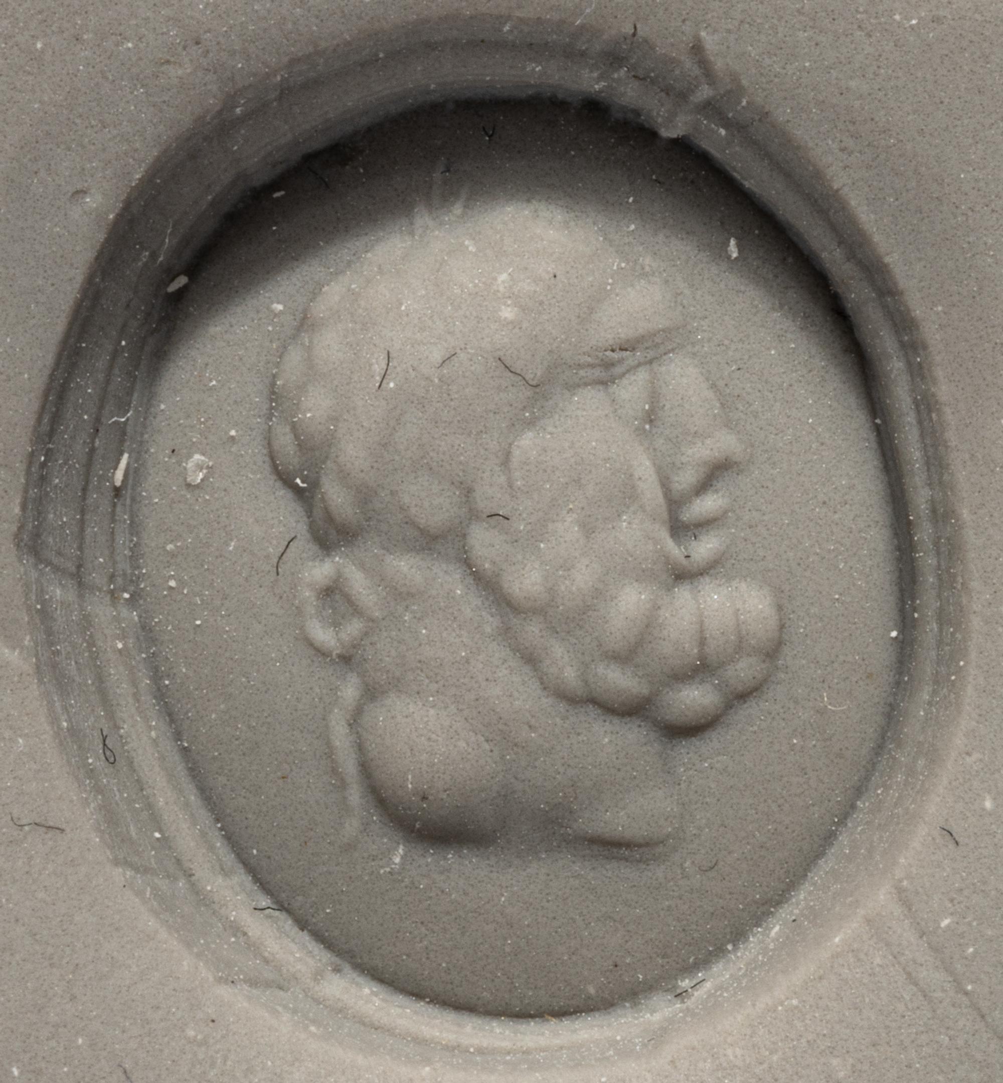 A Roman Banded Agate Ring Stone with the Portrait Head of a Bearded Hercules