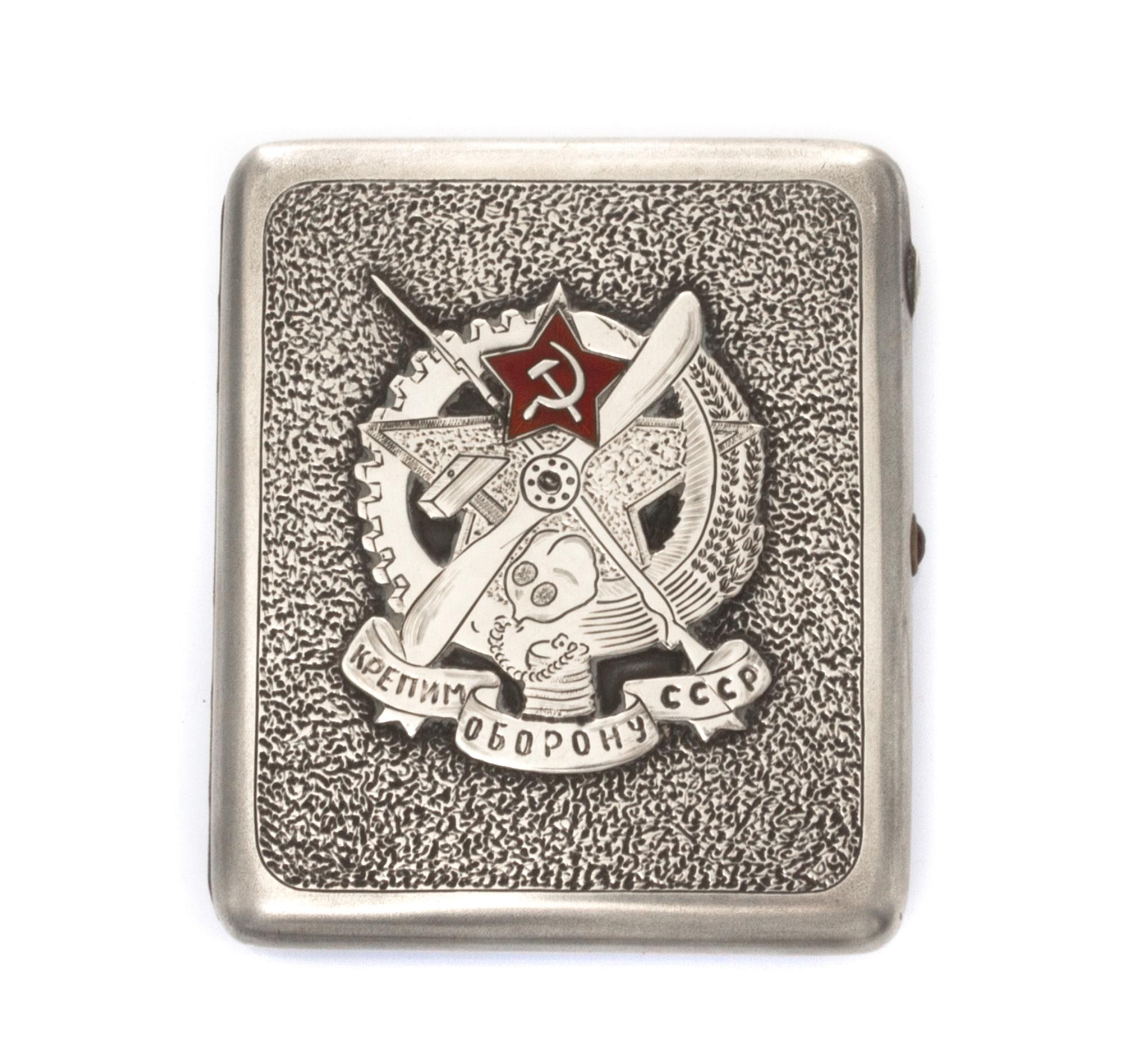 A Russian Silver and Enamel Cigarette Case, Mark of a Soviet-era Artel, Moscow, of rectangular form, the lid applied with the seal of O