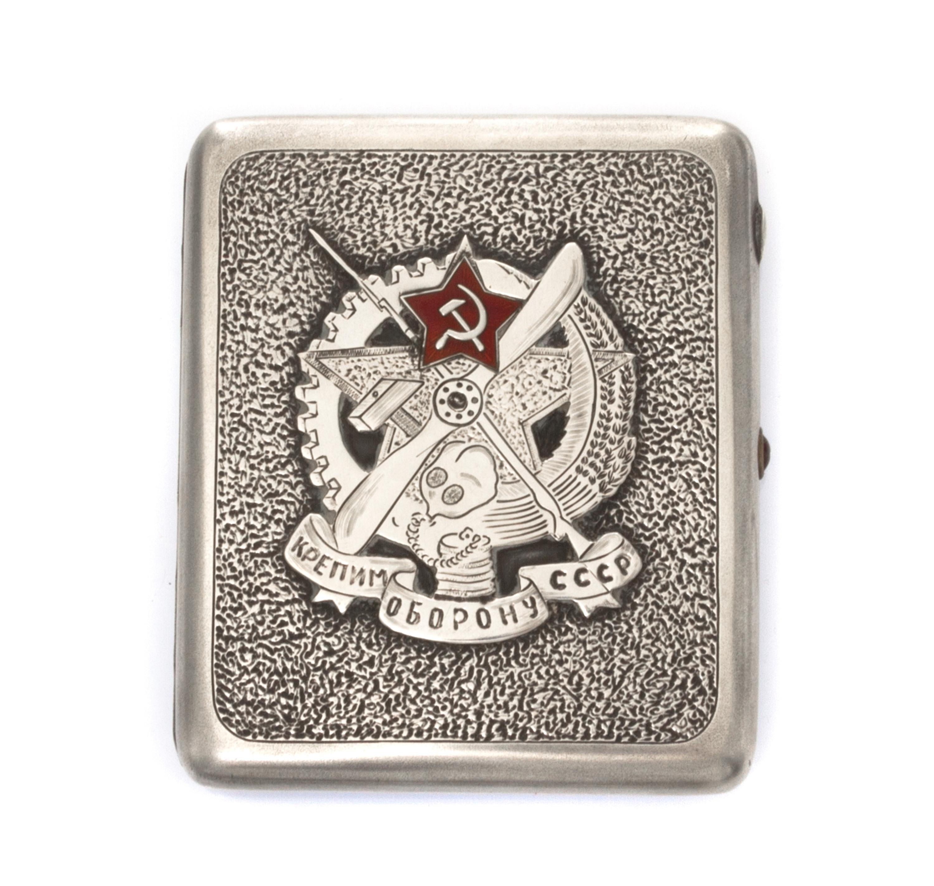 A Russian Silver and Enamel Cigarette Case, Mark of a Soviet-era Artel, Moscow, of rectangular form, the lid applied with the seal of O